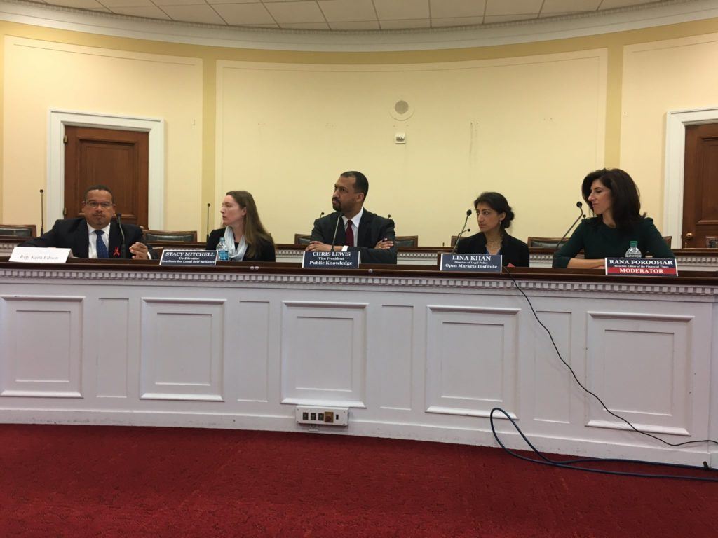 Photo: Stacy Mitchell on panel at Congressional briefing.